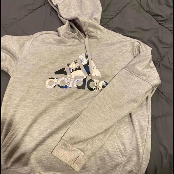 Women’s floral adidas sweatshirt.